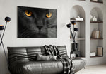 Cat glass wall art styled above a bed in a bedroom