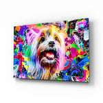 Happy Puppy glass wall art displayed above a black gaming sofa in a brick-walled lounge with neon arcade sign and matte-black coffee table