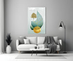 Tree on a Leaf close-up showing teal leaf with golden tree on snowy ledge