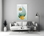 Tree on a Leaf close-up showing teal leaf with golden tree on snowy ledge