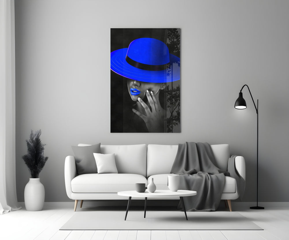 Blue Hat close-up showing woman in wide-brim cobalt hat with cobalt lips