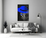 Blue Hat close-up showing woman in wide-brim cobalt hat with cobalt lips