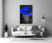Blue Hat close-up showing woman in wide-brim cobalt hat with cobalt lips