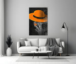 Orange Hat close-up showing woman in wide-brim tangerine hat with orange lips