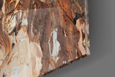 Woman artwork anchoring a wall with warm painterly palette