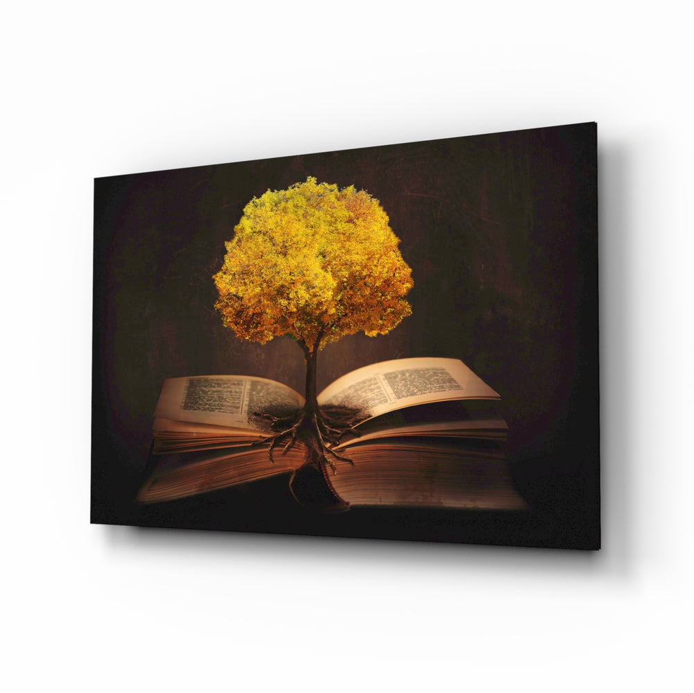 Tree in My Mind glass wall art displayed above a leather chesterfield in a mahogany-paneled library with brass desk lamp and antique books