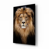 Lion glass wall art displayed beside a leather chesterfield in a slate-walled man cave with reclaimed-wood console and matte-black floor lamp