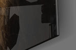 Lion artwork anchoring a wall with dark primal palette