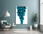 Blue Layers glass wall art styled above a bed in a bedroom
