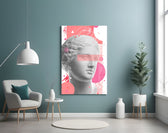 Statue glass wall art styled above a desk in a kids room