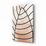 Lines of Leaf glass wall art displayed above a marble vanity in a blush bathroom with brushed-brass faucet and stoneware tray