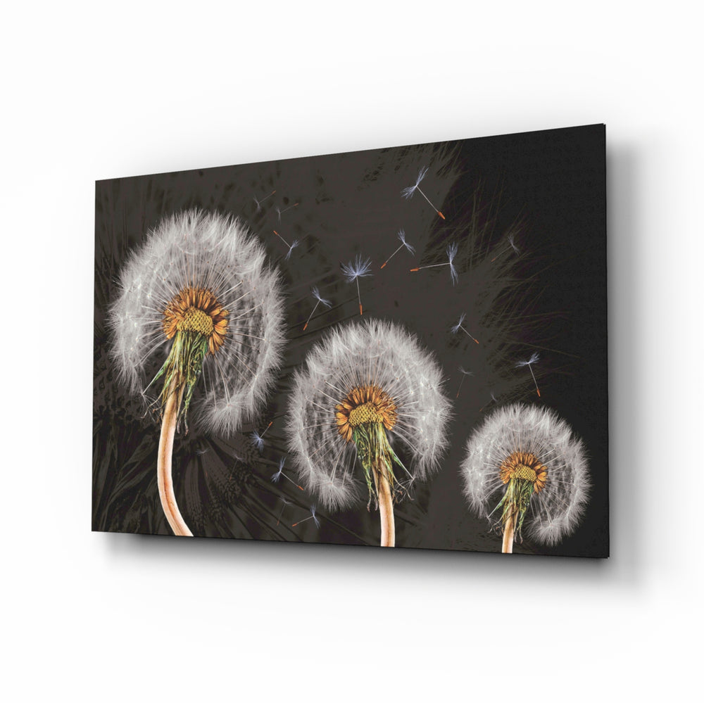 Dandelions glass wall art displayed above a charcoal velvet bed in a slate bedroom with brushed-brass sconces and onyx nightstands