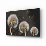 Dandelions glass wall art displayed above a charcoal velvet bed in a slate bedroom with brushed-brass sconces and onyx nightstands