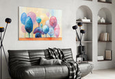 Trees of a Dream glass wall art styled above a bed in a kids room