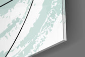 Chaotic artwork anchoring a wall with soft minimalist palette