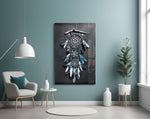 Dreamcatcher glass wall art styled above a bed in a bedroom