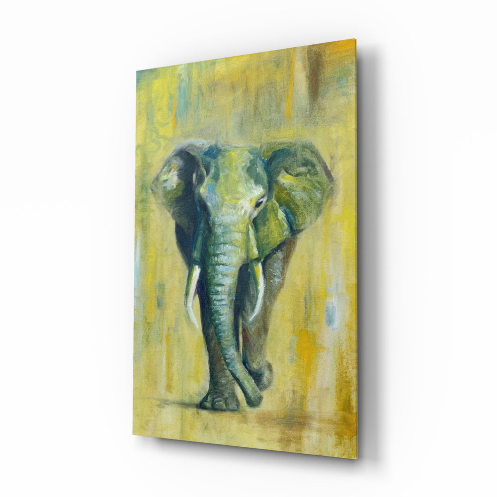 Elephant glass wall art displayed above a charcoal sofa in a marigold-painted lounge with reclaimed-wood console and brass picture light