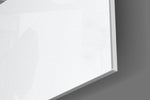 Black Moon artwork anchoring a wall with bright Japandi palette