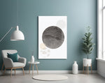 Black Moon glass wall art styled above a bed in a bedroom