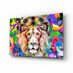 Lion in Colors glass wall art displayed above a black gaming sofa in a brick-walled lounge with neon arcade sign and matte-black coffee table