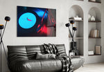 Gramophone glass wall art styled above a turntable shelf in a man cave