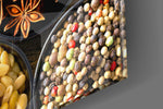 Spices artwork anchoring a wall with warm naturalist palette