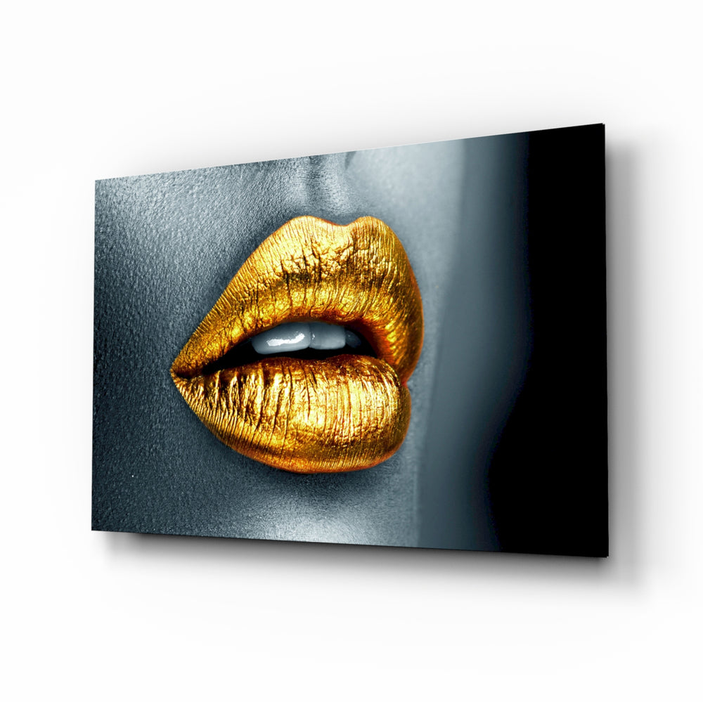 Golden Lips glass wall art displayed above a velvet bed in a charcoal bedroom with brushed-brass sconces and walnut console