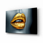 Golden Lips glass wall art displayed above a velvet bed in a charcoal bedroom with brushed-brass sconces and walnut console