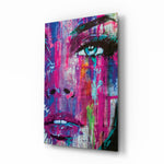Woman Eye glass wall art displayed above a velvet bed in a magenta bedroom with rattan nightstands and brushed-brass sconces