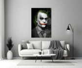 Joker close-up showing chalk face cracked grin and acid-green hair