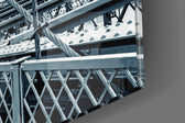 Brooklyn Bridge artwork anchoring a wall with cool monochrome palette