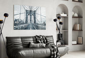 Brooklyn Bridge glass wall art styled above a desk in an office