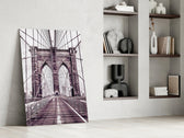 Brooklyn Bridge glass print enhancing a study with cinematic warmth