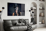 Sssh glass wall art styled above a console in a hallway