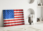 Flag of the United States close-up showing stars and stripes painted across wood planks
