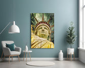 The Statue of Liberty glass wall art styled above a desk in an office
