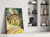 The Statue of Liberty glass print enhancing a study with cinematic warmth