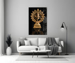 Shiva Nataraja close-up showing brass dancer within flaming halo on polished pedestal