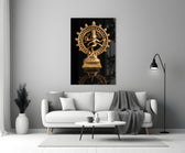 Shiva Nataraja close-up showing brass dancer within flaming halo on polished pedestal