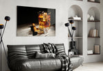 Whiskey glass wall art styled above a sideboard in a home bar