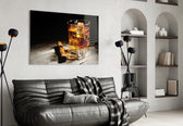 Whiskey glass wall art styled above a sideboard in a home bar