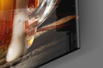 Beer artwork anchoring a wall with moody rustic palette