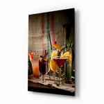 Cocktails glass wall art displayed above a walnut sideboard in a moody dining room with reclaimed-wood beams and brass picture light