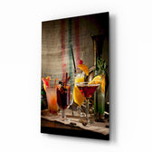 Cocktails glass wall art displayed above a walnut sideboard in a moody dining room with reclaimed-wood beams and brass picture light