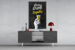 Tequila panel catching directional light to reveal its bar-room wit