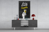 Tequila panel catching directional light to reveal its bar-room wit