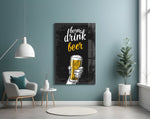 Beer glass wall art styled above a sideboard in a home bar