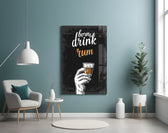 Rum glass wall art styled above a sideboard in a home bar