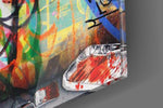 Banksy, Love is the Answer artwork anchoring a wall with bold vibrant palette