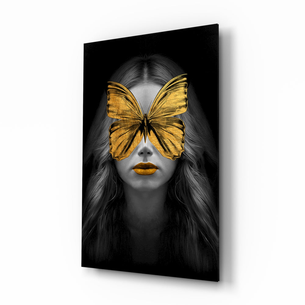 Butterfly Eyes glass wall art displayed above a velvet bed in a moody bedroom with rattan nightstands and brushed-brass sconces